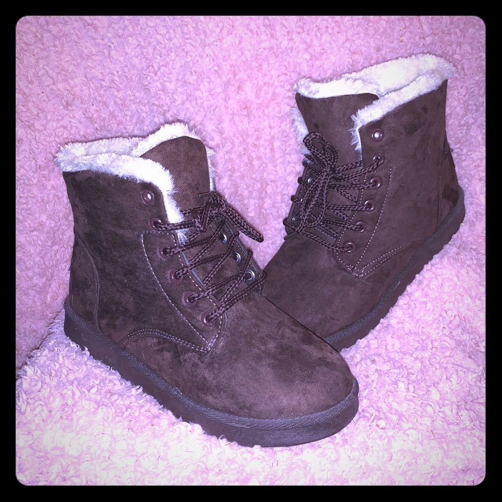 Chocolate brown sway boots with faux fur lining.